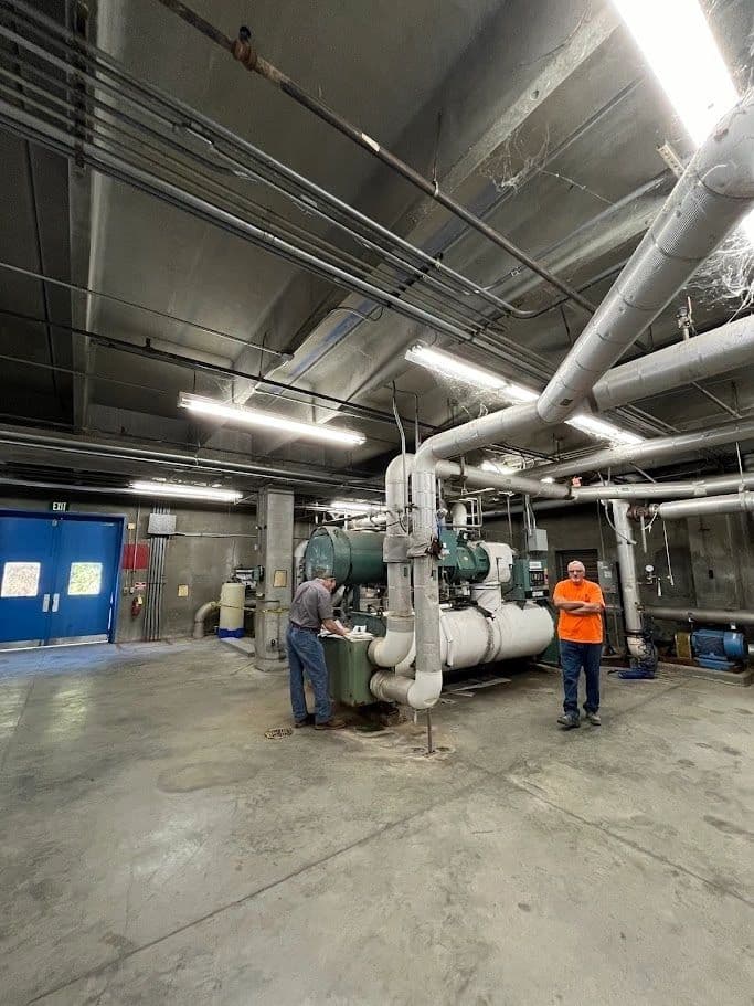 Chilled-water equipment and pipework in a mechanical room